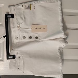 High rise white shorts, button fly closer